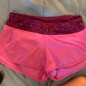 Pink lululemon speed shorts